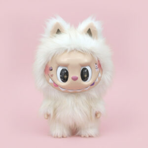 A large, 38cm white fluffy cat plush doll, centered against a solid pastel pink background. The doll has a smooth, kawaii-style vinyl face with large, sparkly eyes and a small smile, highlighted by soft studio lighting that accentuates the plush texture.